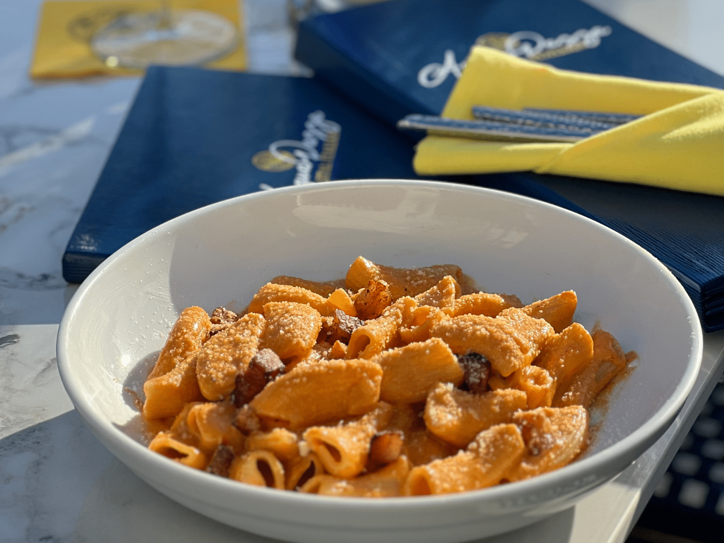 Pasta in large white bowl